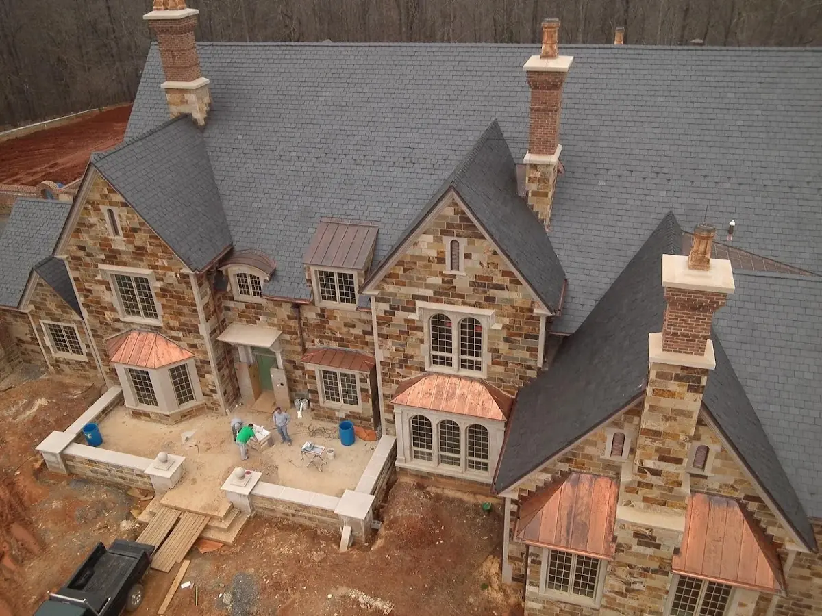 Craftsman Roofing Slate Roof Repair project in Bordeaux Chateau